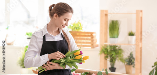 Young florist with bouquet ...