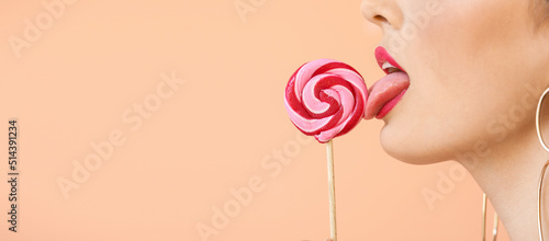 Sexy young woman with lolli...