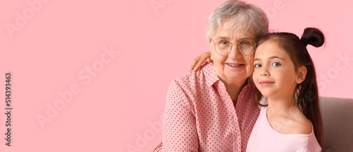 Senior woman with her littl...