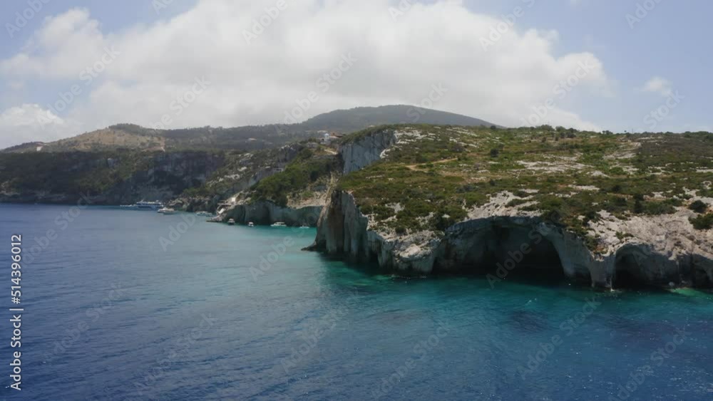 Drone shot of a mediterranean sea scenery, turquoise, boats, mountain. Drone shot of a mediterranean sea scenery, turquoise, boats, mountain.
