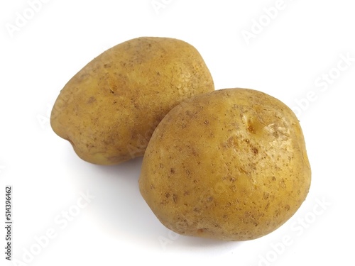Unpeeled raw potato, isolated on white background.