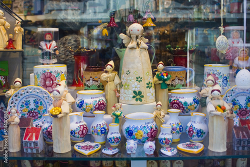 Ceramic souvenirs and dolls on the showcase in Bratislava