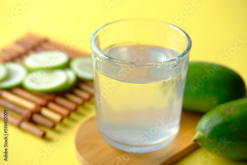 Refreshing lemon water drink on table , top view 