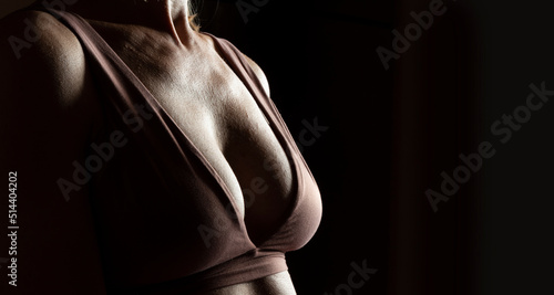 Natural sensual female breasts. Beautiful slim female body.