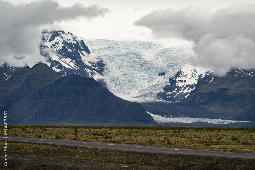 iceland glacier besides lava field