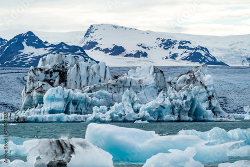 Wallpaper Mural iceberg and floating blocks of ice in glacier lagoon Torontodigital.ca