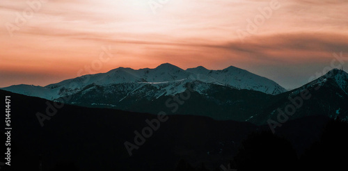 Papier peint Scenic View Of Silhouette Mountains Against Sky During Sunset