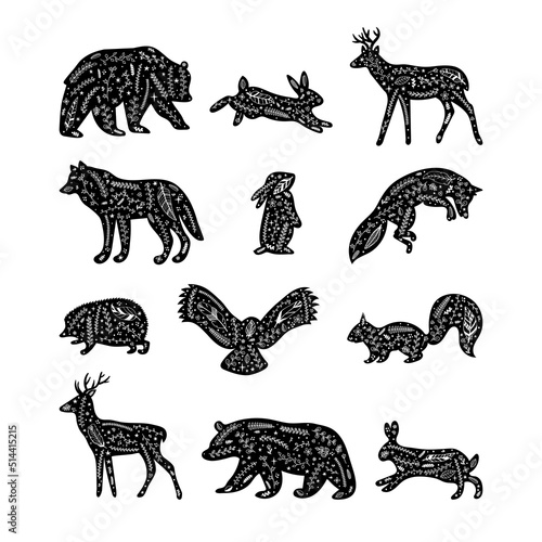 Forest animals with floral elements. Hand drawn silhouettes. Wild woodland animals. Flourish ornament