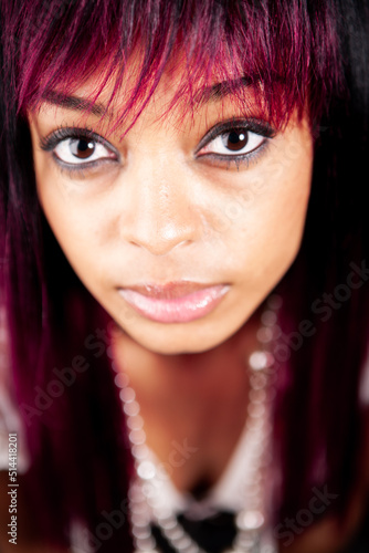 Red hair  a close portrait. An extreme close up portrait of a confident young female model. From a series of images with the same model.