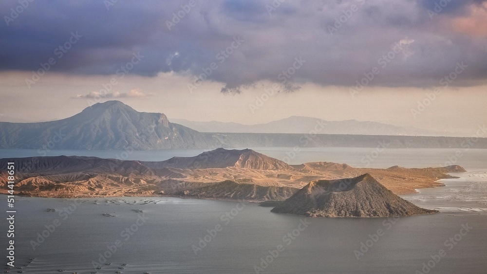 Scenic View Of Sea And Mountains Against Sky