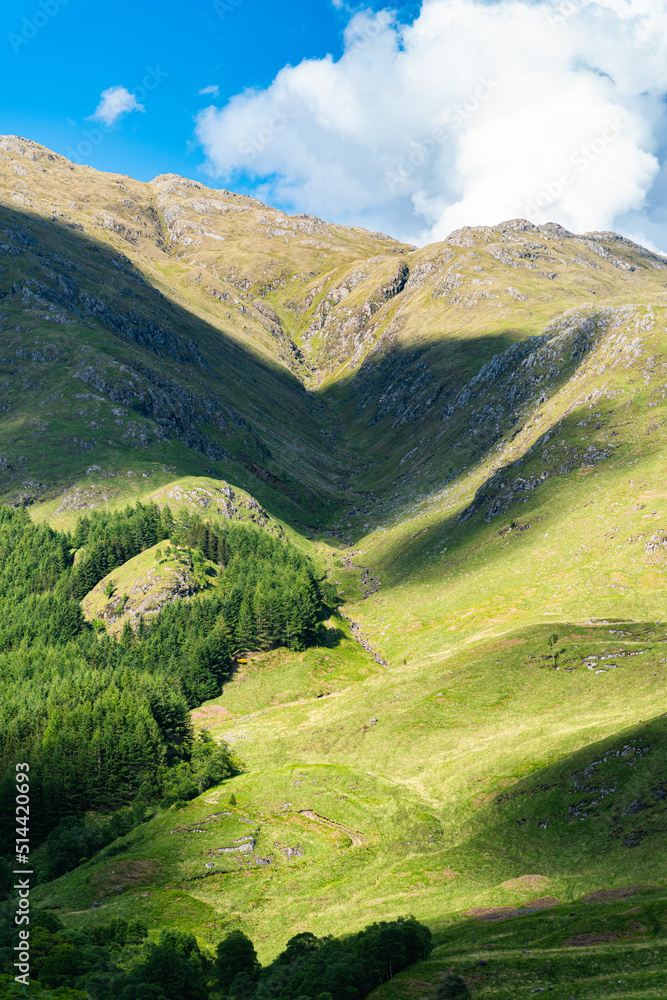 Naklejka premium Mountains over Glenfinnan Viaduct, West Highland Line in Glenfinnan, Inverness-shire, Scotland
