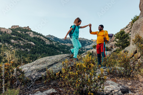 Hikers climbing in the mountains
