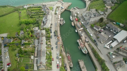 Aerial view of Charletown Harbour with view of town and St Austell clay mines in background, St Austell, Charlestown, Cornwall, United Kingdom. photo