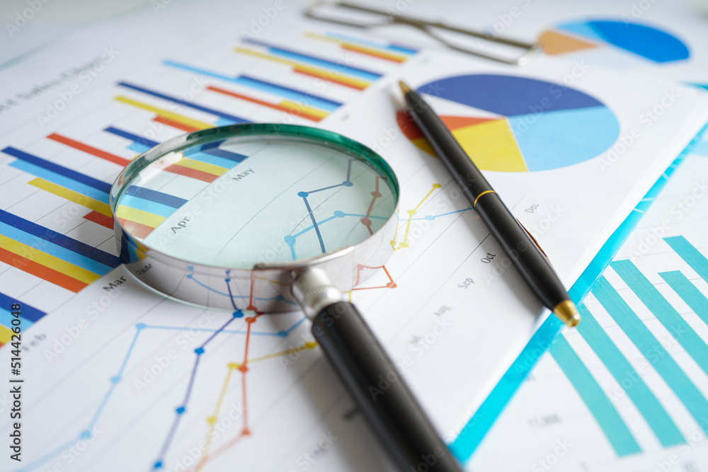 Pen on chart or graph paper. Financial, account, statistics and business data concept.. Pen on chart or graph paper. Financial, account, statistics and business data concept..