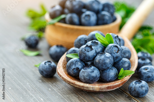 Fresh blueberries background with copy space for your text. Blueberry antioxidant organic superfood in a bowl concept for healthy eating and nutrition photo