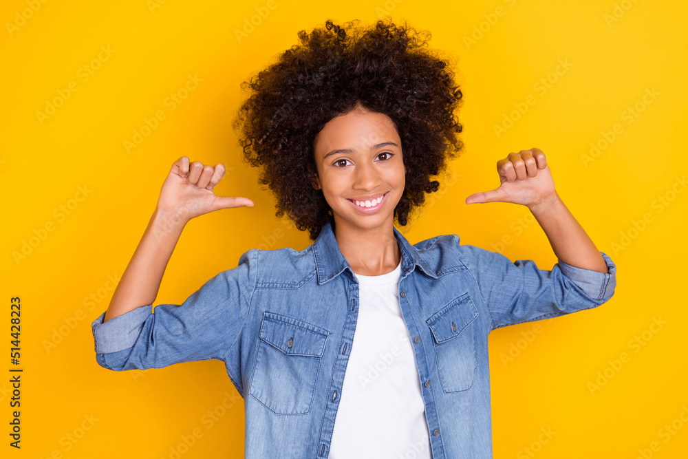Portrait of attractive cheerful teen age girl pointing at herself recommend isolated over bright yellow color background Portrait of attractive cheerful teen age girl pointing at herself recommend isolated over bright yellow color background
