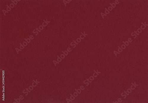 High detail large image of an maroon, crimson, dark red uncoated paper texture background scan with smooth grain fiber with copyspace for text for mock up and high resolution wallpaper