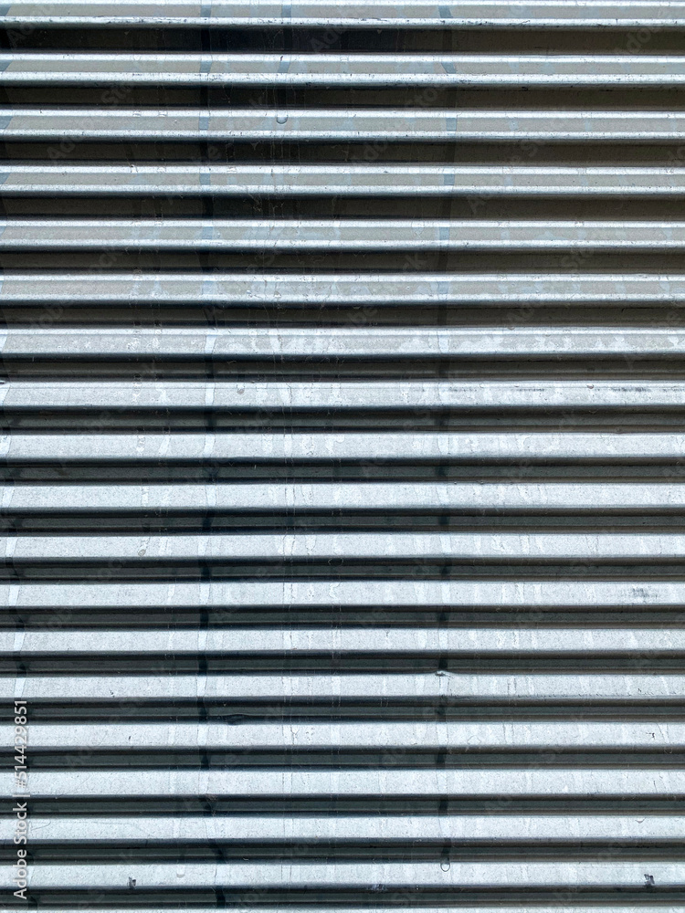 The aesthetic appearance of the door made of metal material, repeating itself. The aesthetic appearance of the door made of metal material, repeating itself.