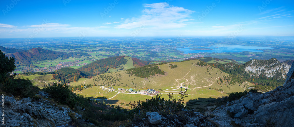 view from Kampenwand mountain to alpine foothills and lake Chiemsee, bavaria in autumn