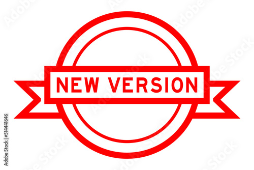 Vintage red color round label banner with word new version on white background