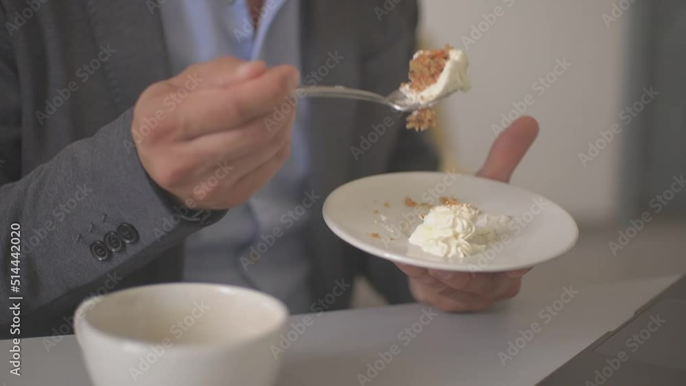 a man with a spoon eats cake a man with a spoon eats cake