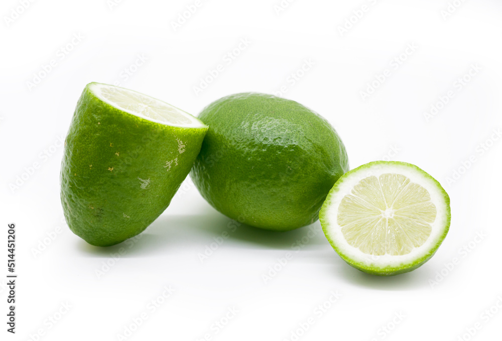 whole and slice Lemons isolated on white background. whole and slice Lemons isolated on white background.