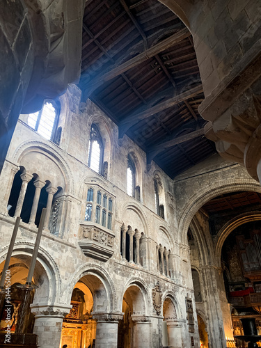 Interior of St. Bartholomew the Great medieval church in City of London. London, England. The Priory Church of St Bartholomew the Great. Anglican church situated at West Smithfield. ceiling, light