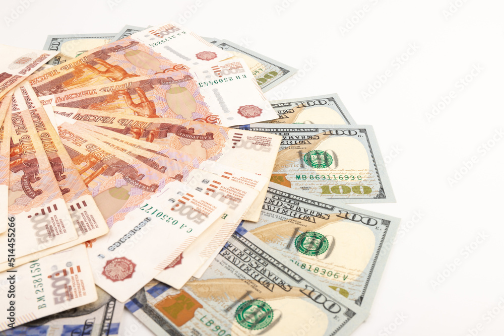 US Dollar and Russian ruble. Money background. Currency exhange. Economic crisis. Rouble dollar cash. Hundred dollar bill and 5000 rubles. Business and finance. Russia and USA US Dollar and Russian ruble. Money background. Currency exhange. Economic crisis. Rouble dollar cash. Hundred dollar bill and 5000 rubles. Business and finance. Russia and USA