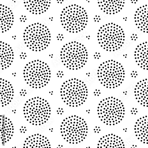 Seamless abstract pattern with funny dotted circles. Hand drawn vector illustration in simple doodle scandinavian style for wallpaper, wrapping paper, textile. © LanaSham