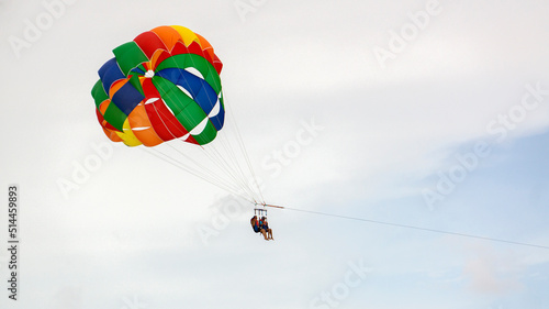 Male, Maldives, 09.10.21 Active entertainment on vacation. Parasailing in the Maldives. Parachute flight