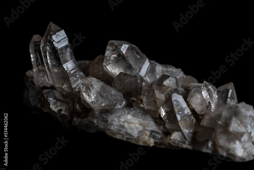 clear quartz crystals on black background