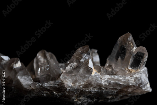 clear quartz crystals on a black background