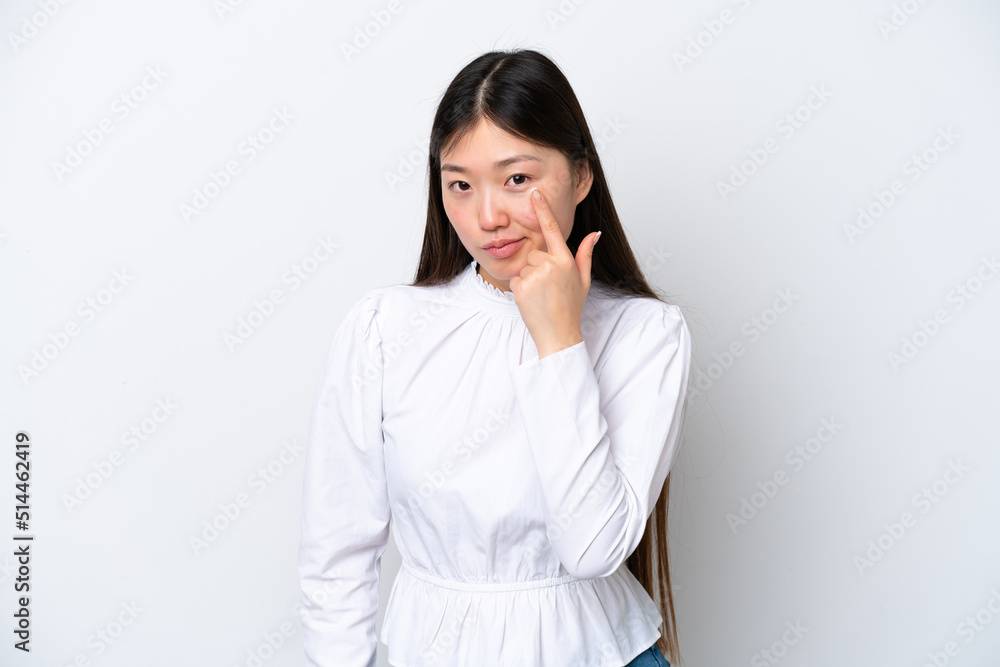 Young Chinese woman isolated on white background showing something Young Chinese woman isolated on white background showing something