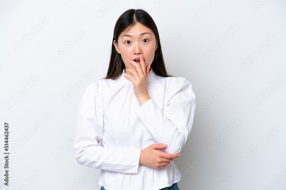 Young Chinese woman isolated on white background surprised and shocked while looking right Young Chinese woman isolated on white background surprised and shocked while looking right