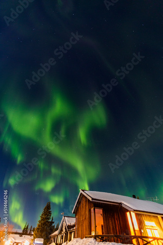 Aurora boreale in Lapponia. ad Abisko in Svezia. Colori nel cielo e tra la neve photo