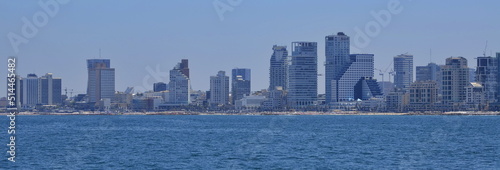 Panorama of Tel Aviv. View from the sea. Mediterranean sea and skyscrapers. Modern city, high-rise buildings, metropolis on the coast © ShU studio