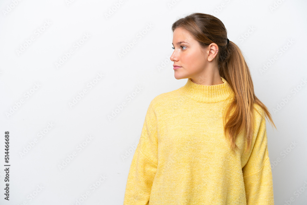 Young caucasian woman isolated on white background looking to the side Young caucasian woman isolated on white background looking to the side