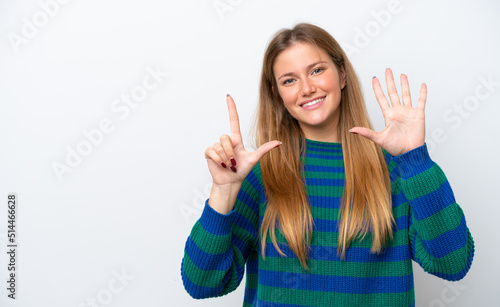 Young caucasian woman isolated on white background counting seven with fingers © luismolinero