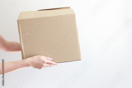 cardboard box for delivery on a white background © Екатерина Арцыбашева