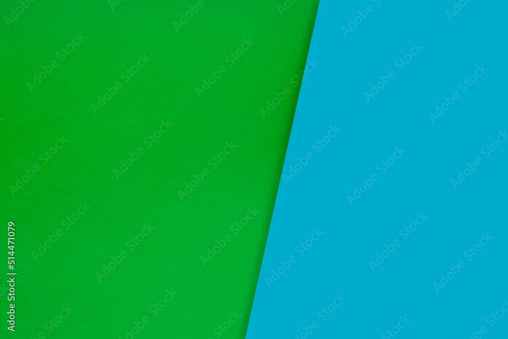 Dark vs light abstract Background with plain subtle smooth de saturated blue green colours parted into two