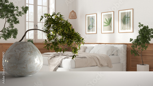White mat table shelf with round marble vase and potted bonsai  green leaves  over modern bedroom  double bed and wooden wall panel  interior design  clean architecture concept idea