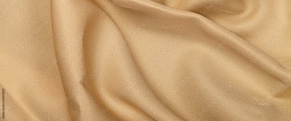 Fototapeta premium Gold silk fabric texture background