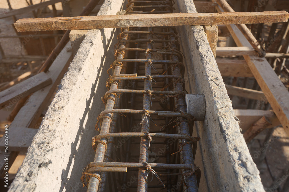 Reinforced steel beams with single concrete spacers round type in