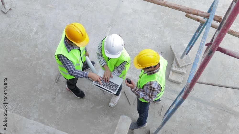 custom made wallpaper toronto digitalEngineers and construction contractors Holding a laptop to discuss building construction plans at the outdoor site. Real estate project concepts, building construction cooperation.