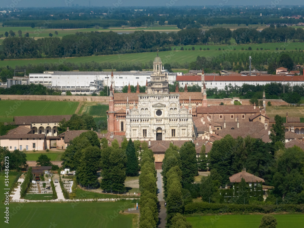 Aerial view of the Certosa di Pavia at sunny day, built in the late fourteenth century, courts and the cloister of the monastery and shrine in the province of Pavia, Lombardia, Italy