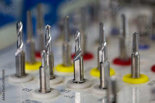 macro dental photo of drills of different lengths for implantation in a set