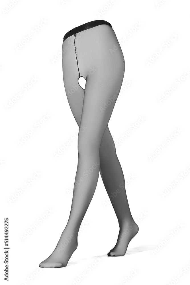 Detailed shot of black tights with an open crotch. The erotic crotchless pantyhose have a shape of walking woman's legs. The woman nylon tights are isolated on the white background. Detailed shot of black tights with an open crotch. The erotic crotchless pantyhose have a shape of walking woman's legs. The woman nylon tights are isolated on the white background.