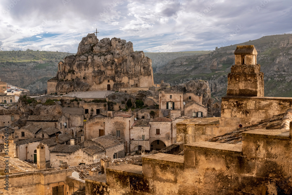 Scenic cityscape of Matera with the cave church Saint Mary of Idris, Southern Italy