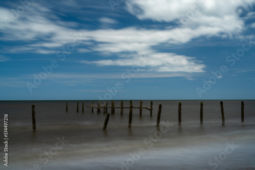 long exposure view of old abandoned sea defenses on Happisburgh Beach