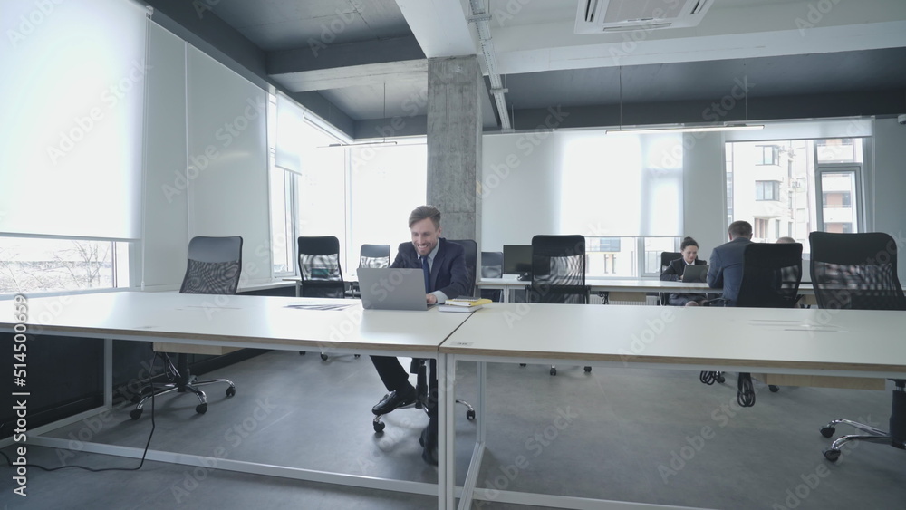 Lazy employee playing video games on office laptop, ignoring work and deadlines Lazy employee playing video games on office laptop, ignoring work and deadlines